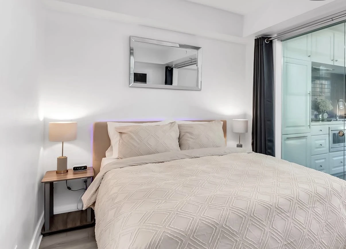 Bedroom of Skyline Suite 2409, North York, a featured Airbnb partner property
